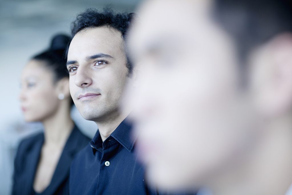 Corporate away days - businessman sitting in business meeting with colleagues